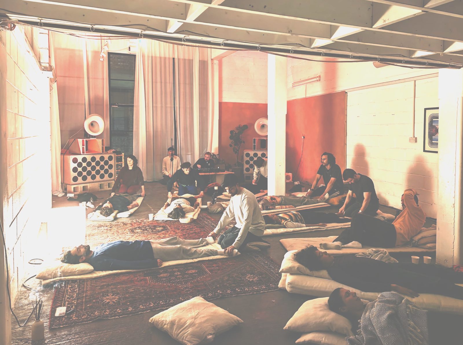 A group giving and receiving Thai massage together